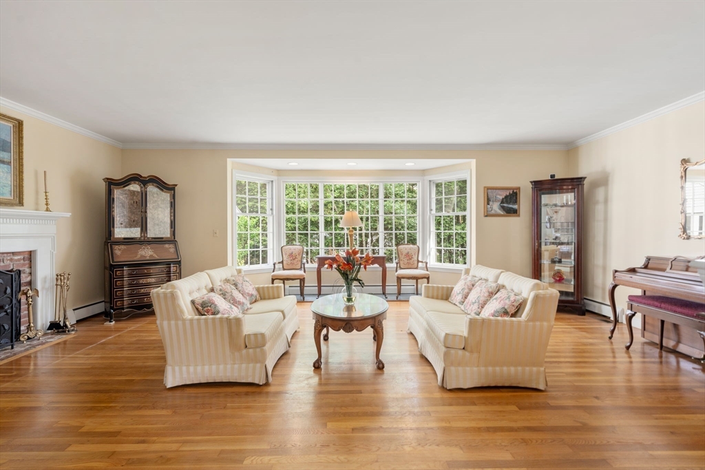 73 Greylock Road Wellesley, MA 02481 - Photo 5 of 26 a living room with furniture and a large window