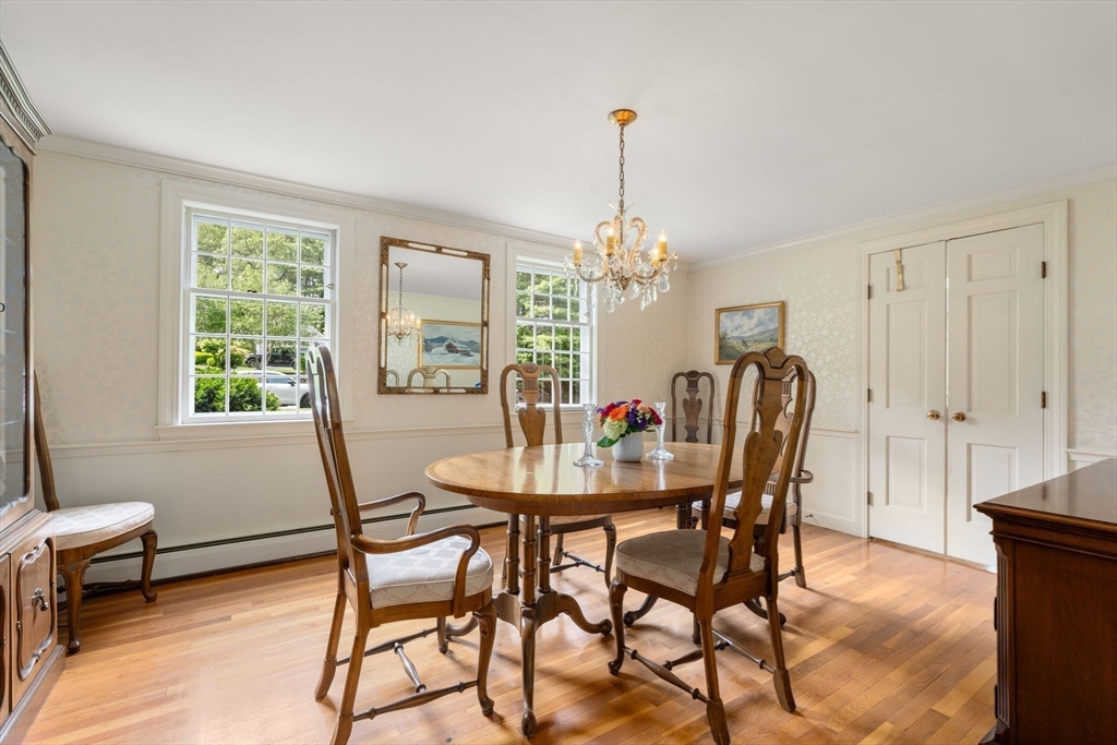 73 Greylock Road Wellesley, MA 02481 - Photo 8 of 26 a view of a dining room with furniture window and outside view
