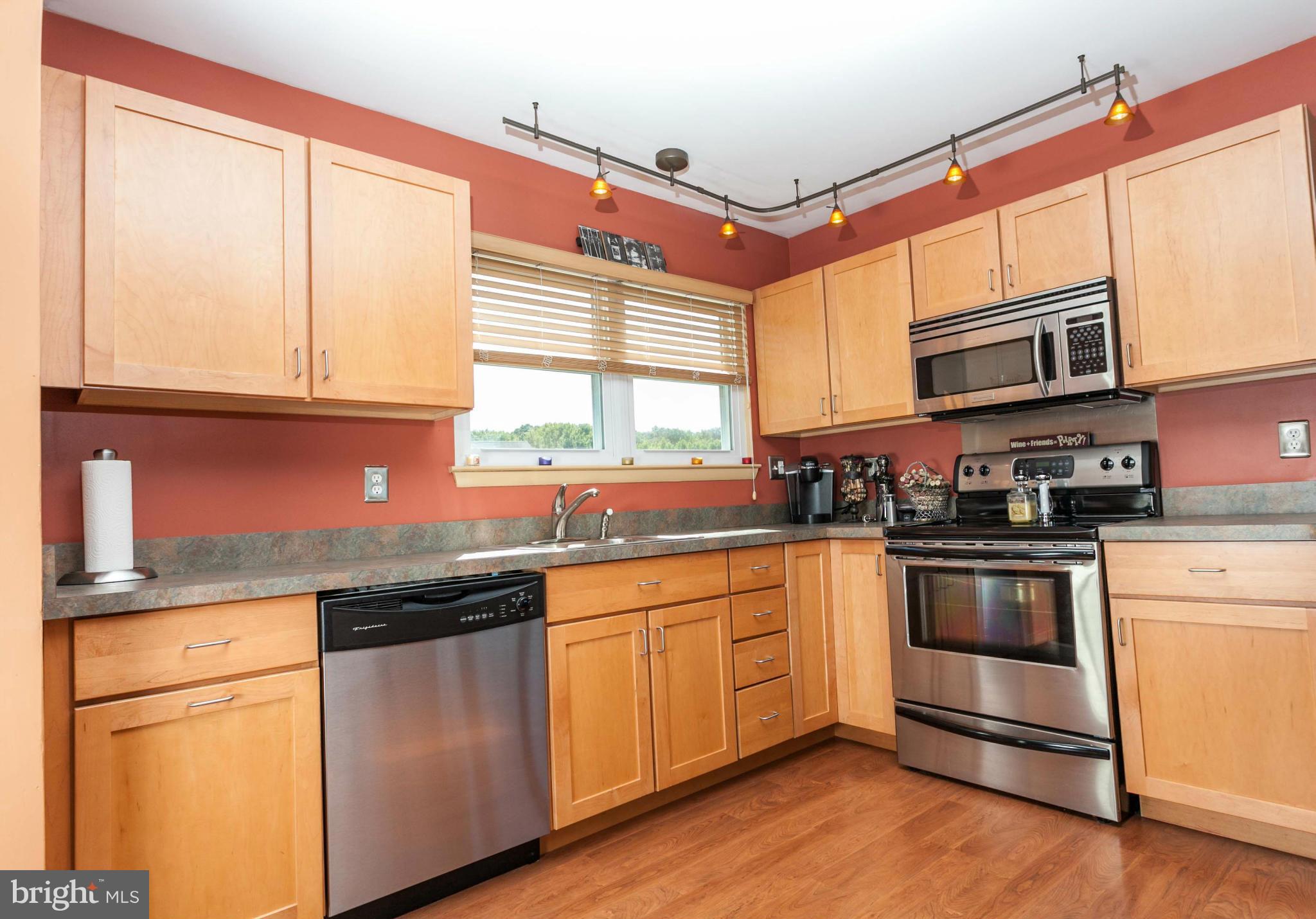 12929 Cunninghill Cove Road Baltimore, MD 21220 - Photo 8 of 28 Kitchen w/Engineered Wood Floors