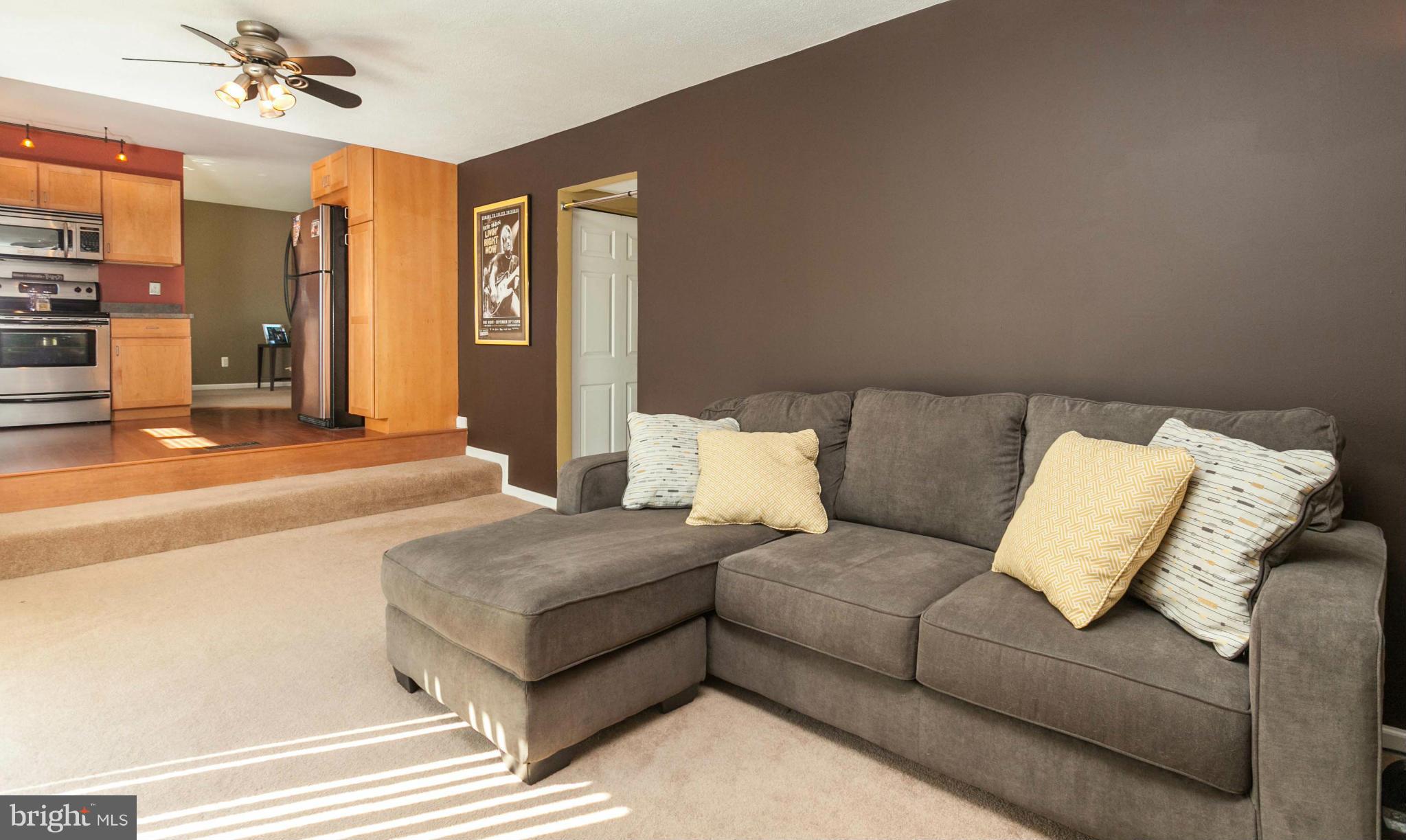 12929 Cunninghill Cove Road Baltimore, MD 21220 - Photo 9 of 28 Family Room Opens to Kitchen