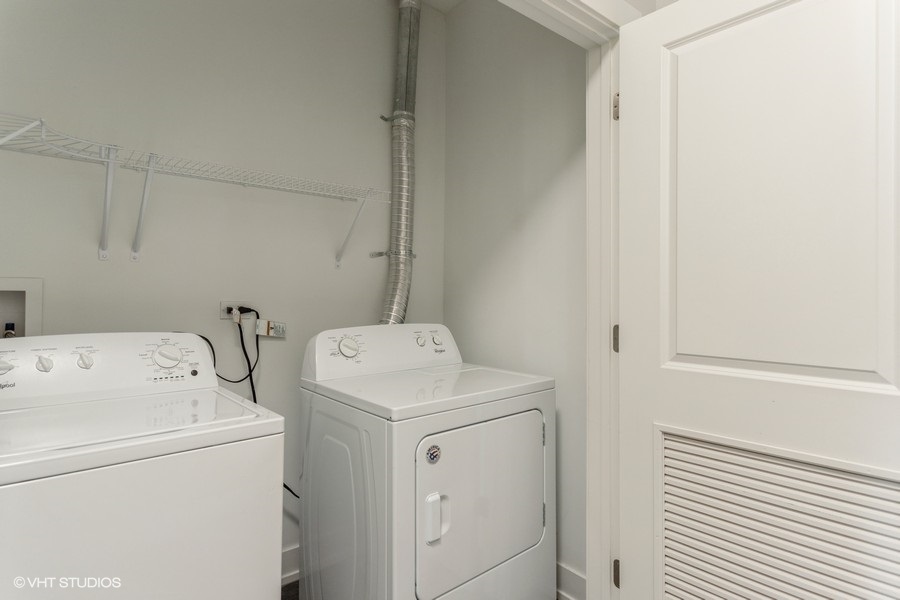 10604 Alice Mae Court Orland Park, IL 60462 - Photo 12 of 14 a utility room with dryer and washer