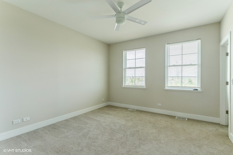 10604 Alice Mae Court Orland Park, IL 60462 - Photo 9 of 14 an empty room with a window