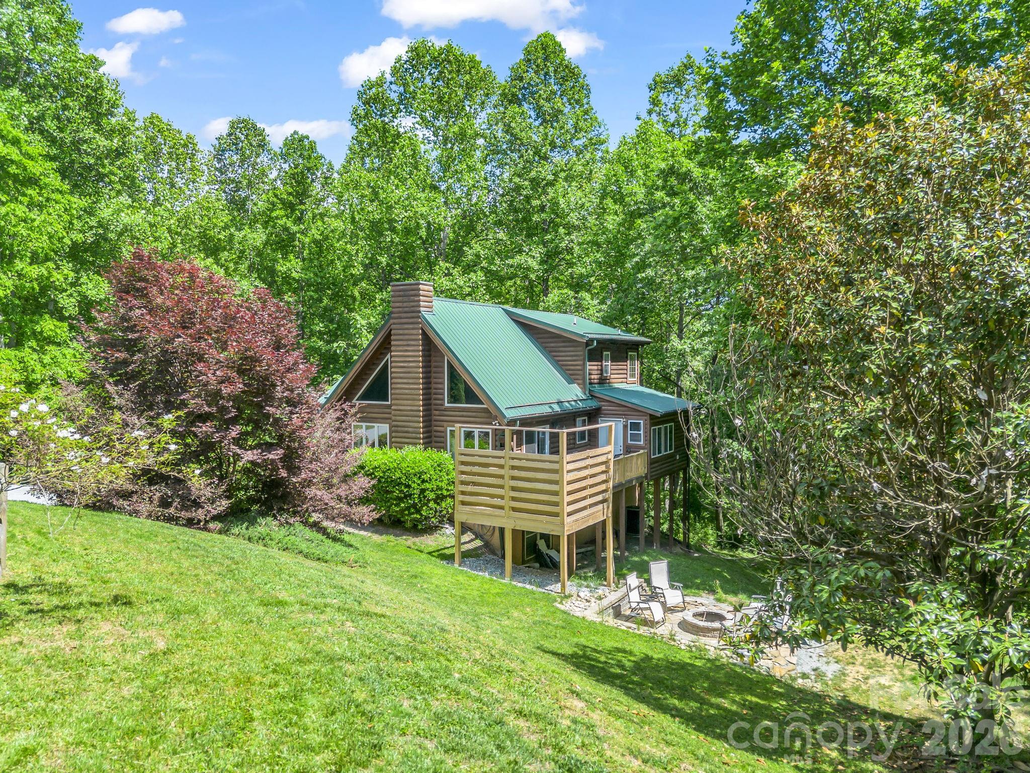 165 Dream Road Hendersonville, NC 28792 - Photo 2 of 46 front view of a house with a yard