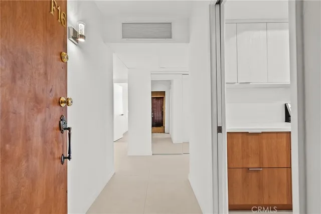 a view of a bathroom from the hallway