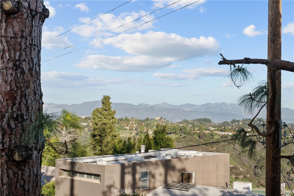 2385 Roscomare Road, Unit F16 Los Angeles, CA 90077 - Photo 31 of 40 a view of a city with a mountain