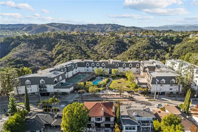 an aerial view of a house with a garden