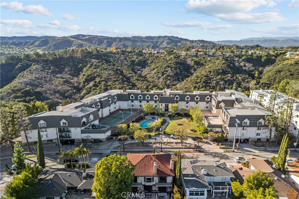 2385 Roscomare Road, Unit F16 Los Angeles, CA 90077 - Photo 37 of 40 an aerial view of a house with a garden