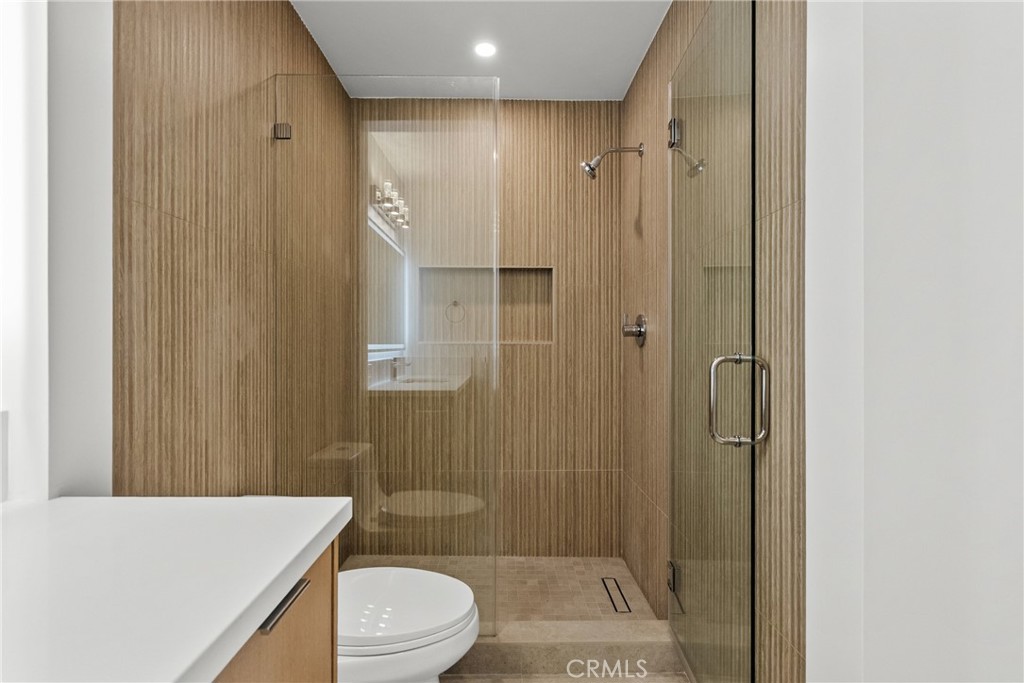 2385 Roscomare Road, Unit F16 Los Angeles, CA 90077 - Photo 10 of 39 a bathroom with a sink a toilet and shower