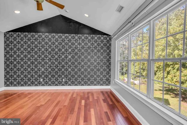 a view of a black and white floor to ceiling window