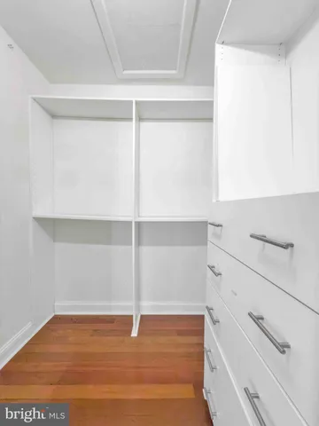 a view of an empty walk in closet