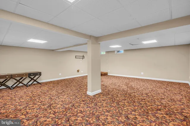 a view of a livingroom with wooden floor