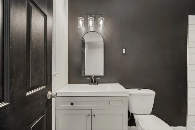 a bathroom with a shower and a toilet