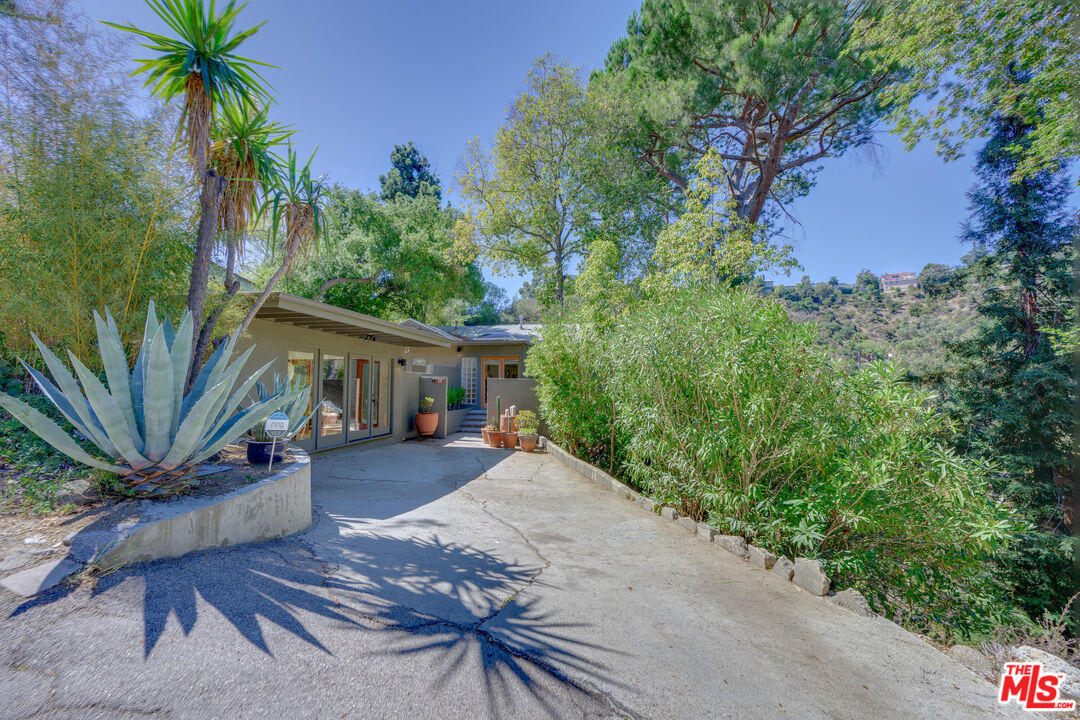 1847 Calgary Lane Los Angeles, CA 90077 - Photo 2 of 43 a view of a house with a patio