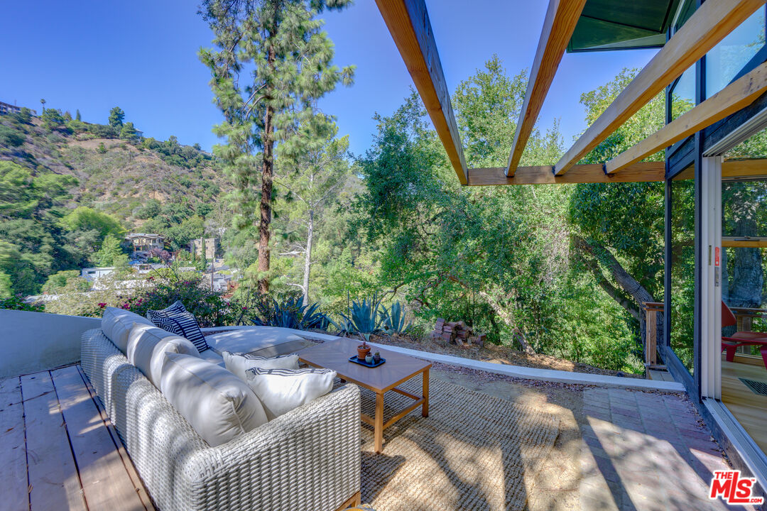 1847 Calgary Lane Los Angeles, CA 90077 - Photo 27 of 43 a view of a couches in a balcony