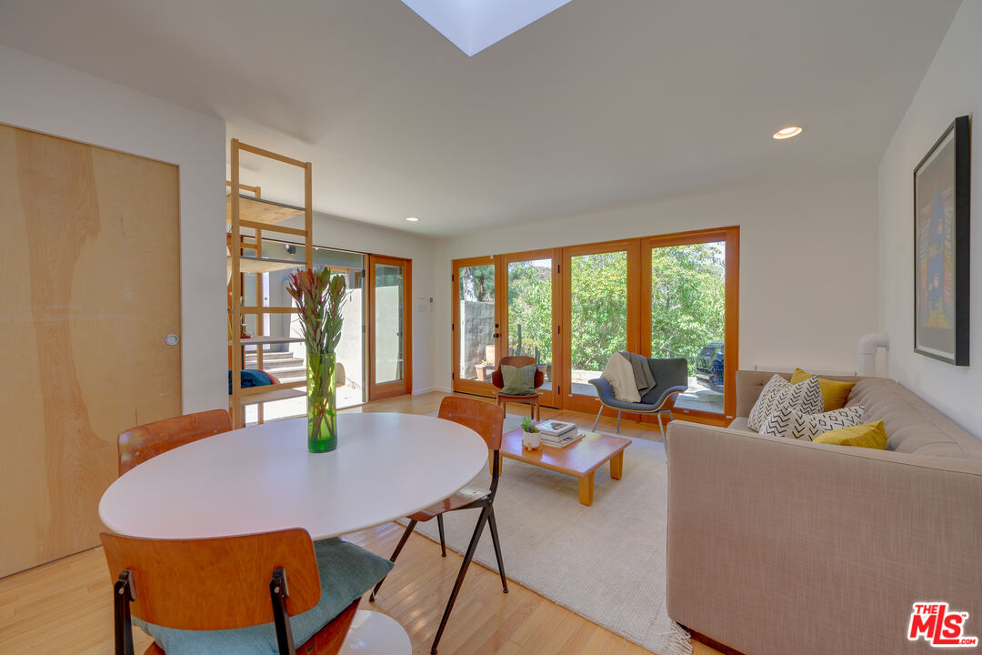 1847 Calgary Lane Los Angeles, CA 90077 - Photo 41 of 43 a living room with furniture and a large window