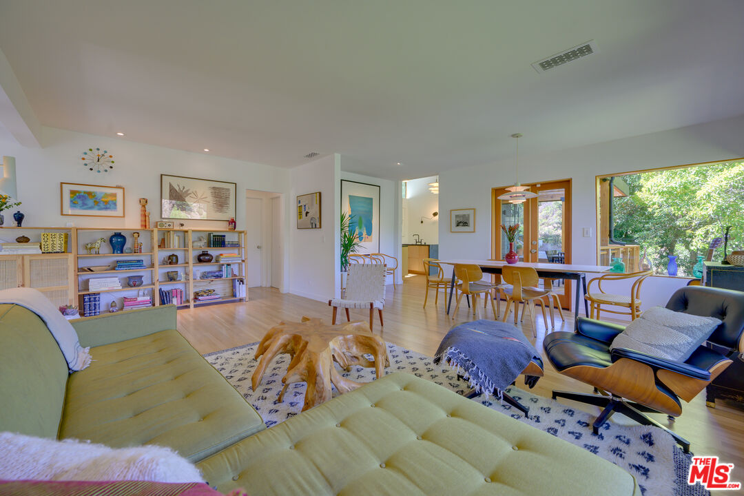 1847 Calgary Lane Los Angeles, CA 90077 - Photo 6 of 43 a living room with furniture and a large window