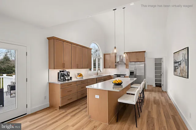wooden floor in an empty room with a fireplace