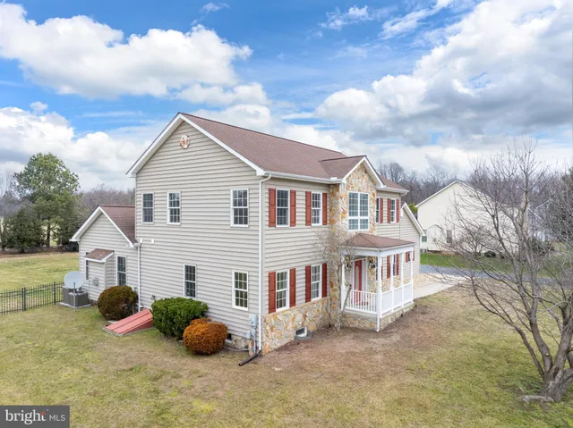 a kitchen with stainless steel appliances a stove and cabinets