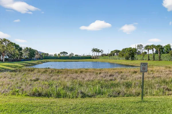 a view of a lake with a big yard