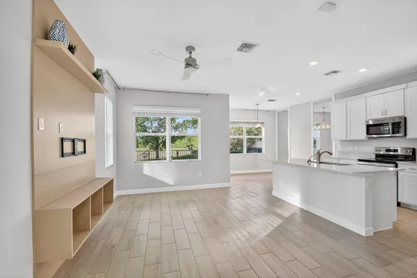 a large kitchen with cabinets