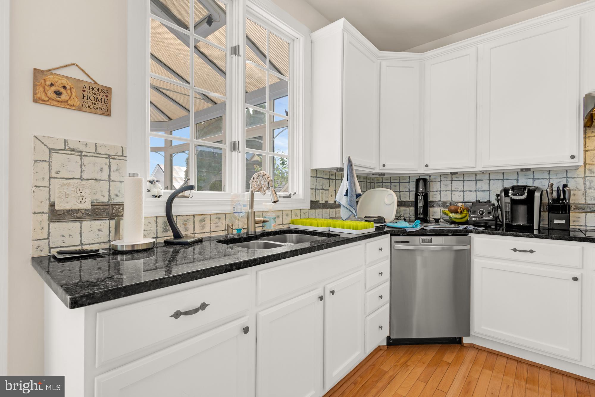 618 Linslade Street Gaithersburg, MD 20878 - Photo 12 of 71 Window into the giant light-filled sunroom