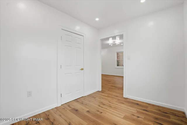 a front view of a house with a yard and porch
