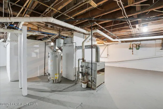 an aerial view of a house with outdoor space