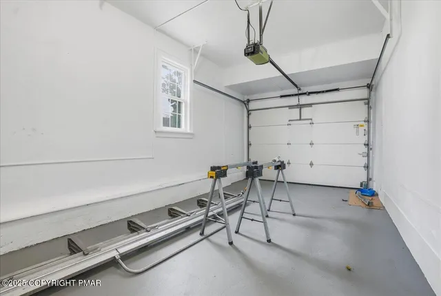 an aerial view of a houses with outdoor space
