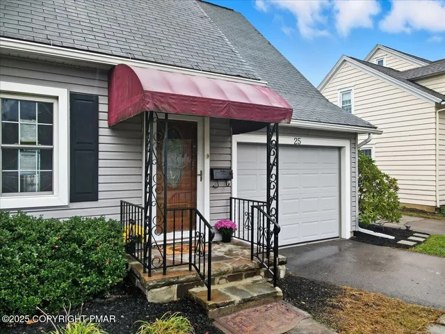 a front view of a house with a porch