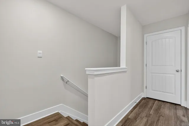 a bedroom with bed and window