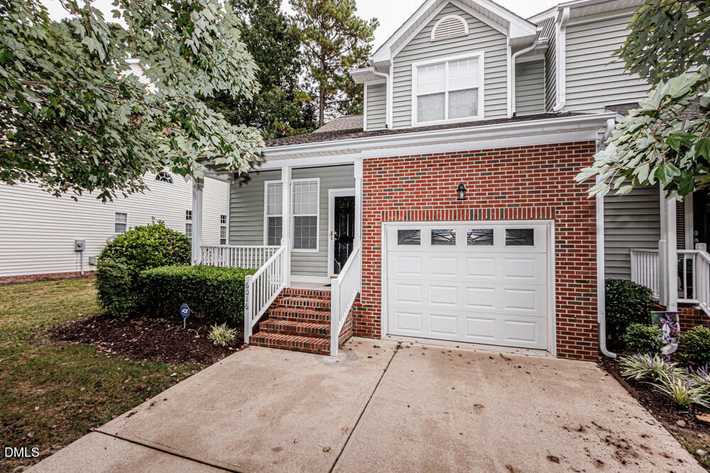 6016 Four Townes Lane Raleigh, NC 27616 - Photo 1 of 32 a view of a house with a yard