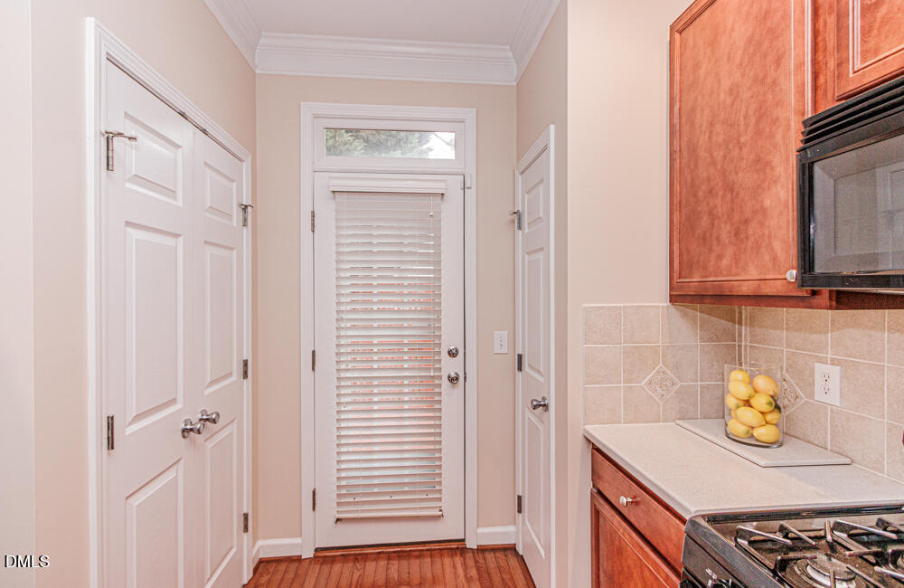 6016 Four Townes Lane Raleigh, NC 27616 - Photo 11 of 32 a kitchen with a sink and cabinets