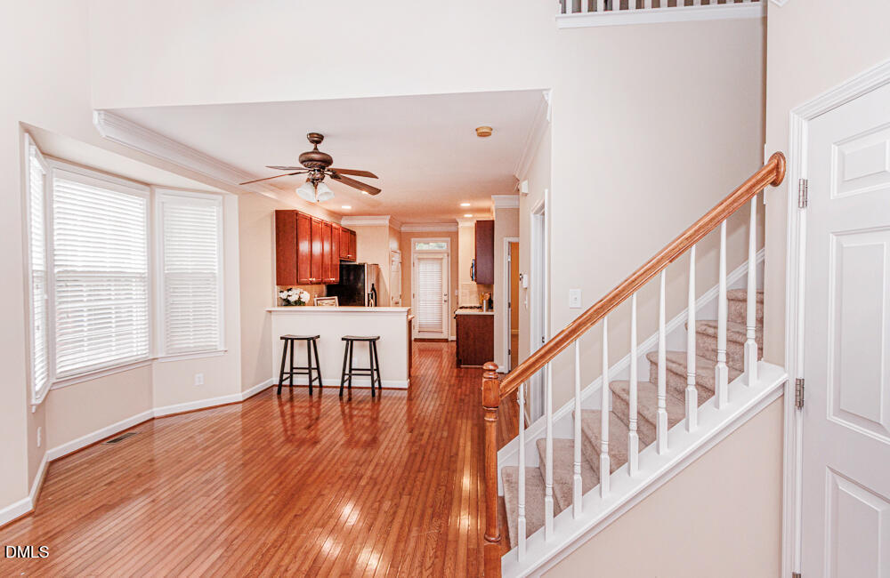 6016 Four Townes Lane Raleigh, NC 27616 - Photo 7 of 32 a view of a livingroom with furniture stairs