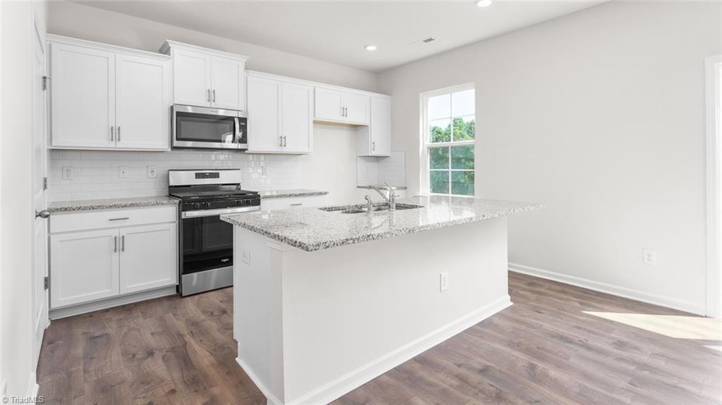 6532 Grogan Hill Road Whitsett, NC 27377 - Photo 6 of 21 *Photos are of model home and are for representational purposes only.