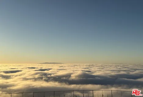 a kitchen with a sink cabinets and window