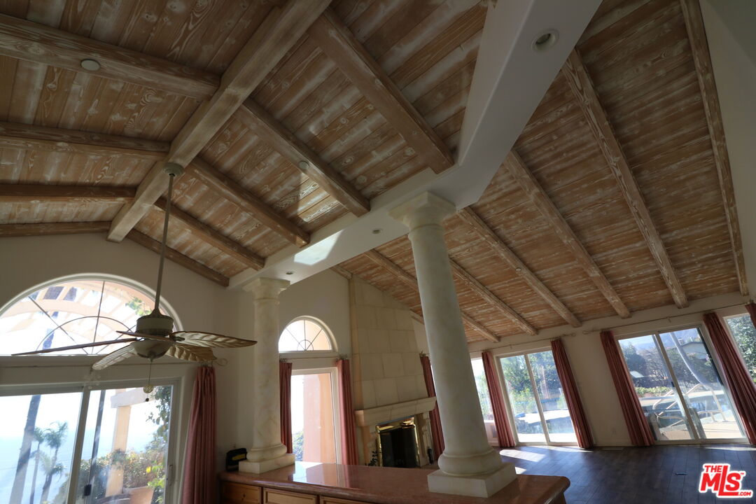 20776 Big Rock Drive Malibu, CA 90265 - Photo 37 of 67 a view of staircase with open kitchen view