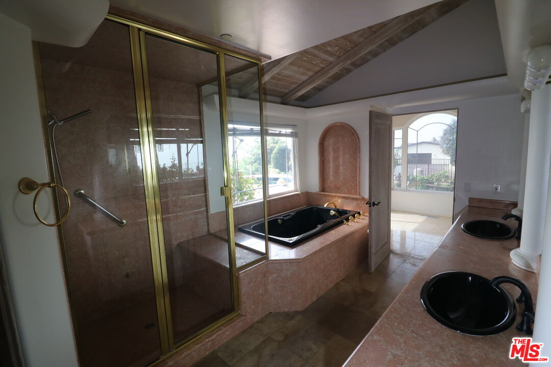 20776 Big Rock Drive Malibu, CA 90265 - Photo 45 of 67 a room with window and furniture