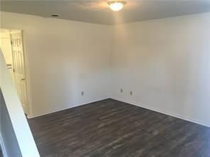 339 Balsinger Road McClellandtown, PA 15458 - Photo 3 of 9 an empty room with wooden floor