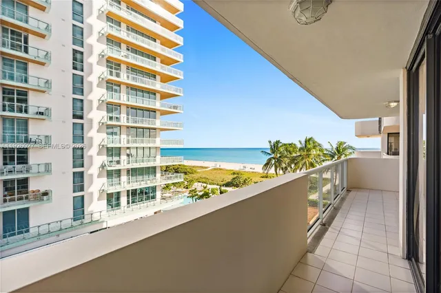 a view of a hallway with a kitchen