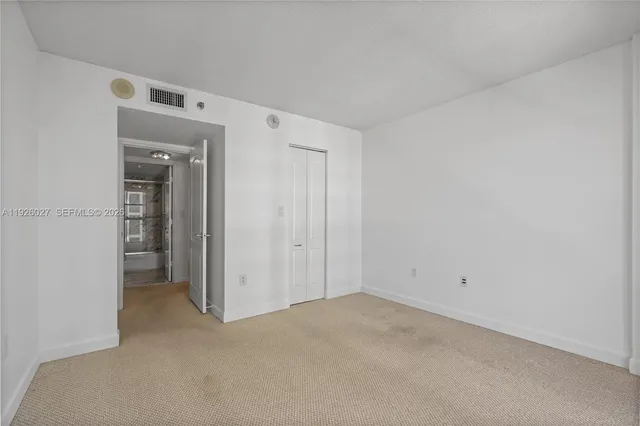 a view of city with ocean