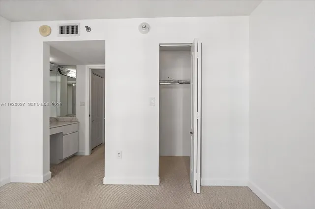 a view of a swimming pool with a lounge chairs