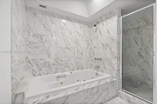 a room with pool table and furniture