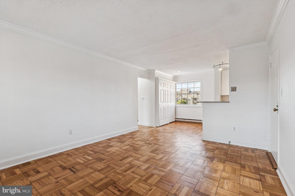 1620 West Abingdon Drive, Unit 301 Alexandria, VA 22314 - Photo 11 of 24 a view of an empty room and window