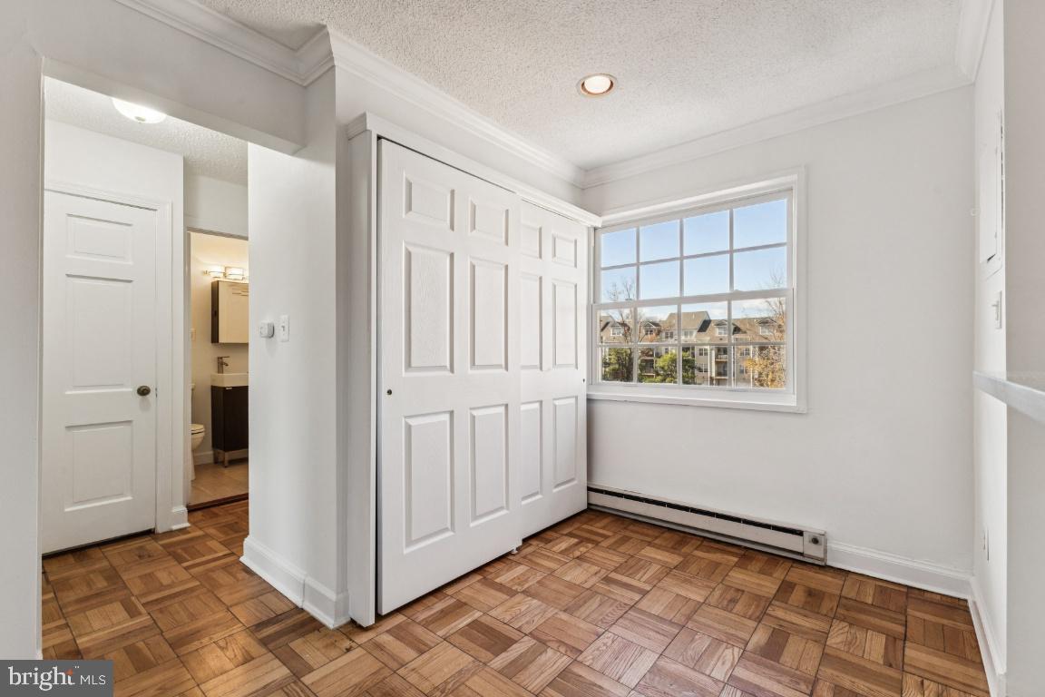 1620 West Abingdon Drive, Unit 301 Alexandria, VA 22314 - Photo 12 of 24 a view of a hallway with closet area