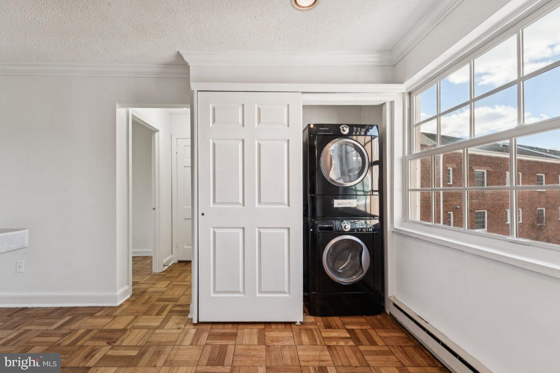 1620 West Abingdon Drive, Unit 301 Alexandria, VA 22314 - Photo 13 of 24 a view of space washer and dryer