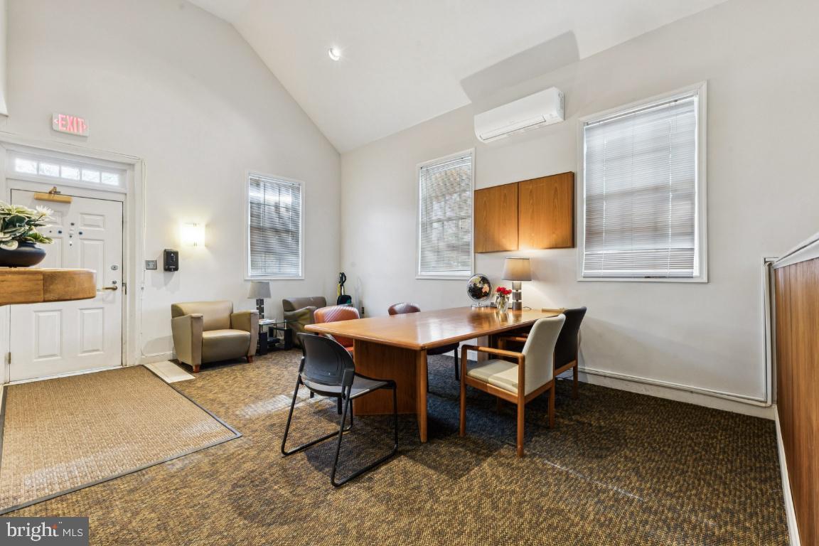 1620 West Abingdon Drive, Unit 301 Alexandria, VA 22314 - Photo 21 of 24 a view of a dining room with furniture