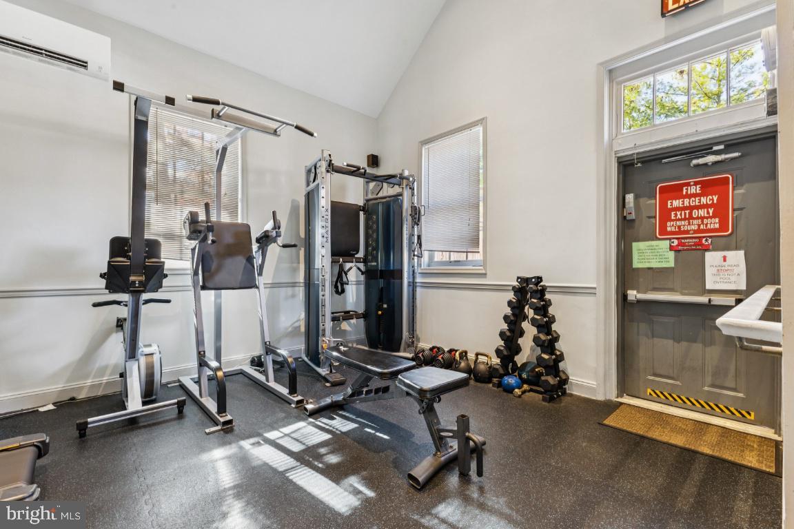 1620 West Abingdon Drive, Unit 301 Alexandria, VA 22314 - Photo 23 of 24 a view of a room with gym equipment