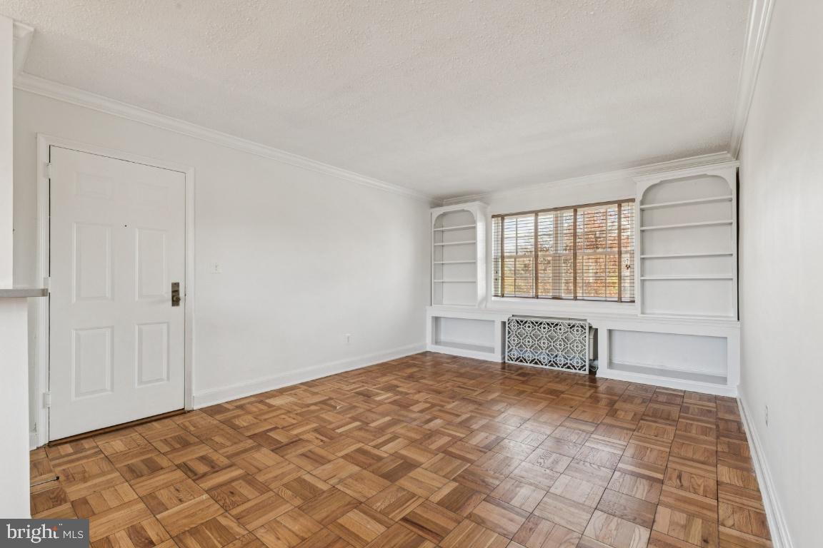 1620 West Abingdon Drive, Unit 301 Alexandria, VA 22314 - Photo 9 of 24 a view of empty room with a window