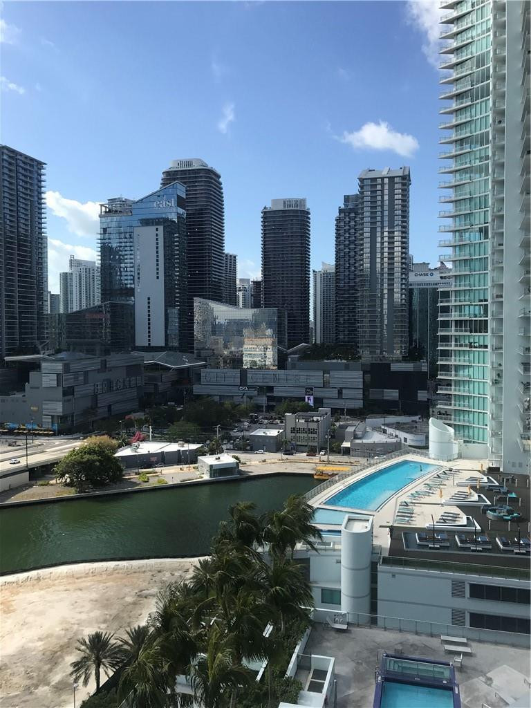 90 Southwest 3rd Street, Unit 1802 Miami, FL 33130 - Photo 23 of 50 a view of a water with tall buildings