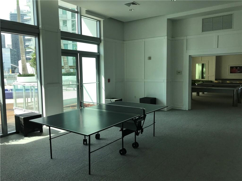 90 Southwest 3rd Street, Unit 1802 Miami, FL 33130 - Photo 33 of 50 a view of a workspace with furniture and a window